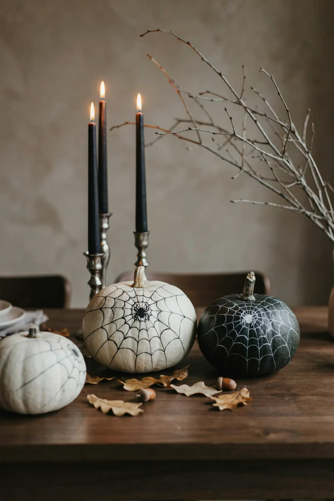 22 Halloween Pumpkin Decor Ideas for a Charming 2026 13 Painted Spiderweb Pumpkins