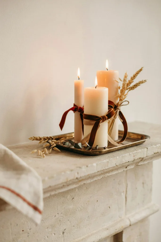 20 Budget-Friendly Fall Decorations for a Luxe Look 16 Ribbon-Wrapped Candles