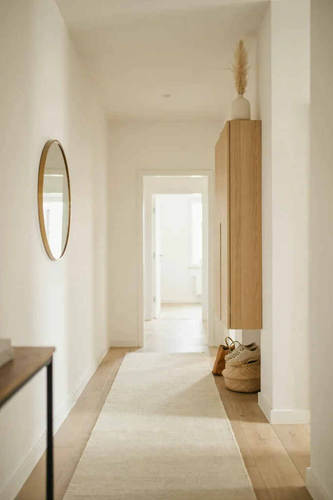 21 Narrow Hallway Decorating Ideas to Try Right Now 11 Floating Shoe Cabinet