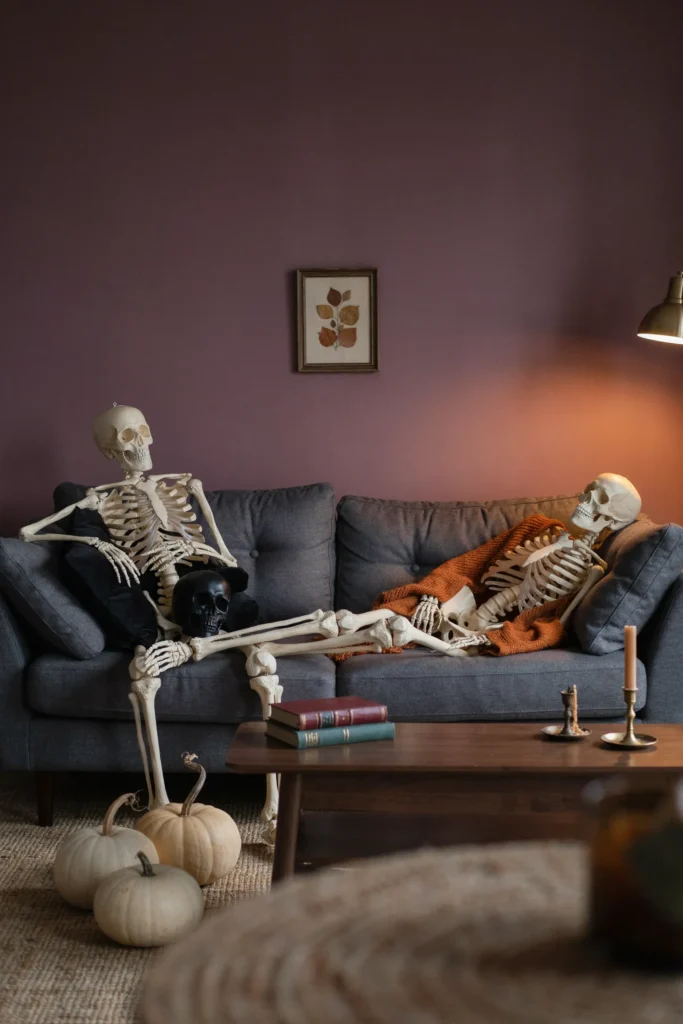 21 Skeleton Halloween Decor Ideas for a Chilling 2026 9 Skeleton Sofa Scene